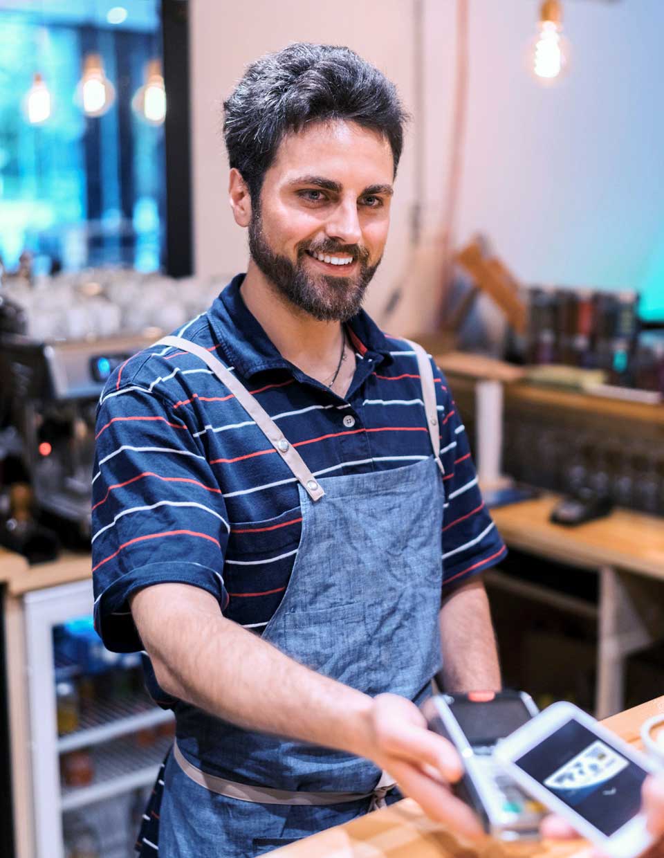 promo image for cafe owner using pos terminal for contactless payment